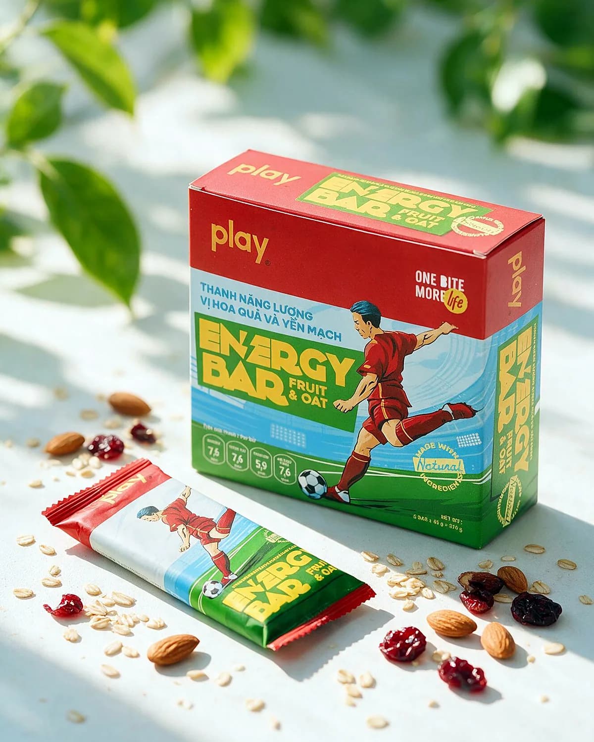PLAY energy bar box at golden hour with oats and nuts